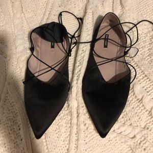 Lace up black flats